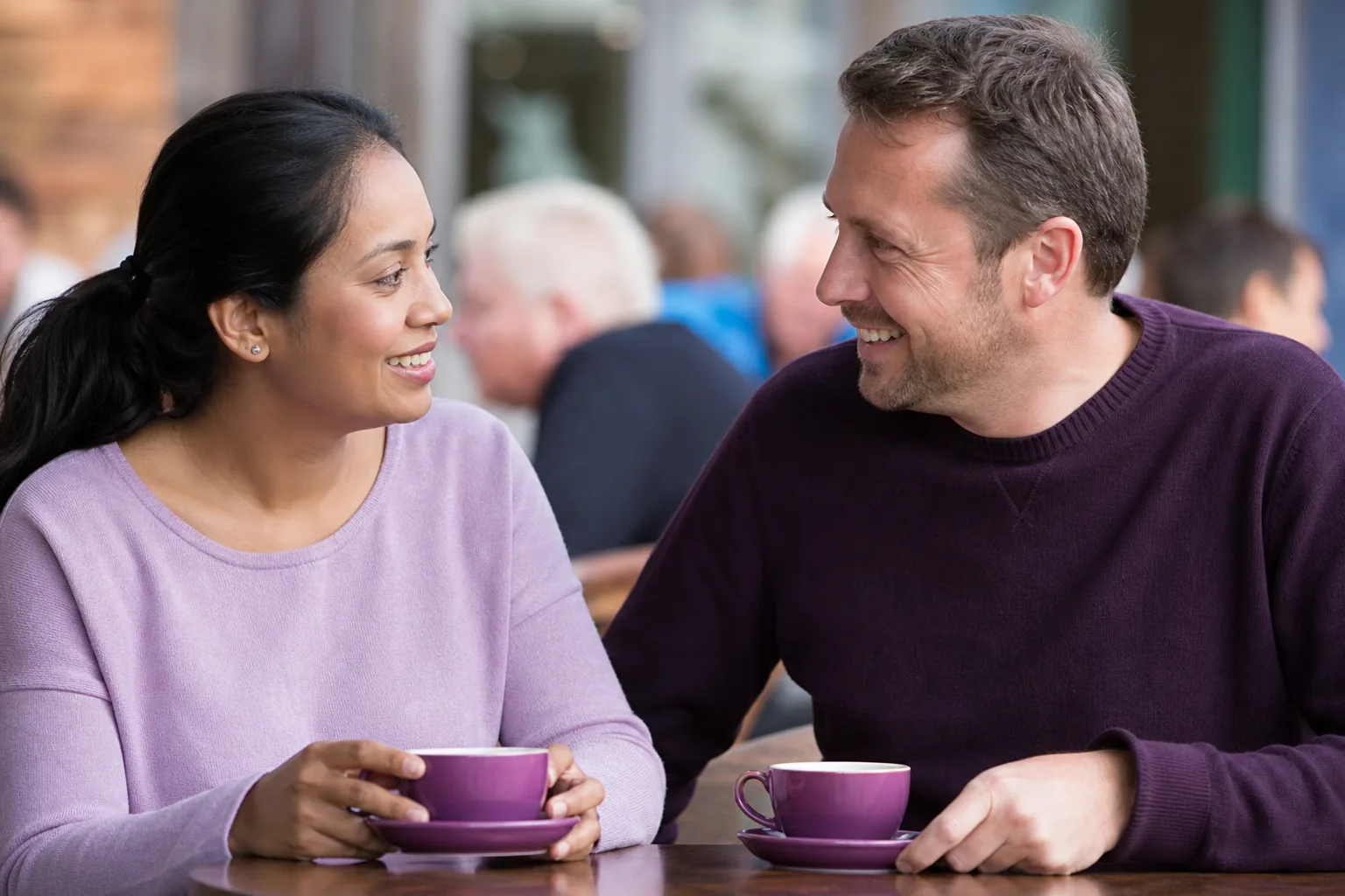 Two single parents talking over coffee in the Lothians